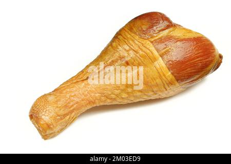 Boiled and smoked turkey leg golden colour isolated on white background Stock Photo
