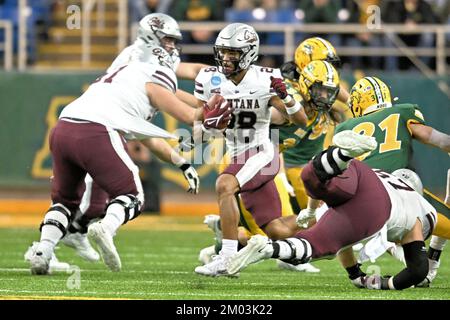 Montana Grizzlies running back Isiah Childs (28) rushes the ball during a NCAA FCS second round playoff game between the University of Montana Grizzlies and the North Dakota State Bison at the Fargo Dome, Fargo, ND on Saturday, December 3, 2022. NDSU defeated Montana 49-26. Russell Hons/CSM Stock Photo