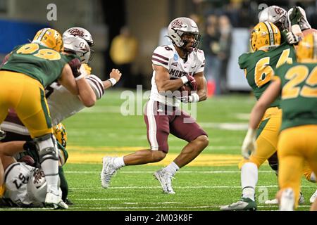 Montana Grizzlies running back Isiah Childs (28) runs with the ball during a NCAA FCS second round playoff game between the University of Montana Grizzlies and the North Dakota State Bison at the Fargo Dome, Fargo, ND on Saturday, December 3, 2022. NDSU defeated Montana 49-26. Russell Hons/CSM Stock Photo