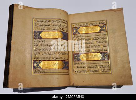 Toronto, Canada - December 2022:  Ancient illuminated manuscript of the Koran, the holy book of Islam, from Persia in the 1500s, in the collection of Stock Photo