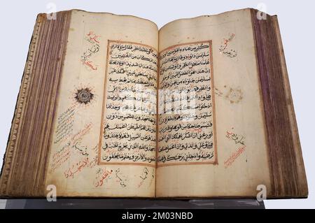 Toronto, Canada - December 2022:  Old handwritten manuscript of the Koran, the holy book of Islam, in the collection of the Aga Khan Museum Stock Photo
