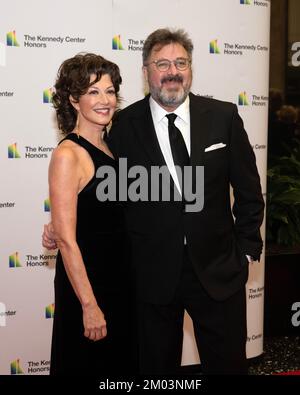 Washington DC, USA. 03rd Dec, 2022. 2022 Kennedy Center honoree Amy Grant, and her husband, Vince Gill, arrives for the formal Artist's Dinner honoring the recipients of the 45th Annual Kennedy Center Honors at the Department of State in Washington, DC on Saturday, December 3, 2022. Credit: MediaPunch Inc/Alamy Live News Stock Photo