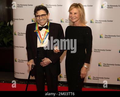 Past Kennedy Center honoree Edward Villella and his wife, Linda, arrive for the formal Artist's Dinner honoring the recipients of the 45th Annual Kennedy Center Honors at the Department of State in Washington, DC on Saturday, December 3, 2022. The 2022 honorees are: actor and filmmaker George Clooney; contemporary Christian and pop singer-songwriter Amy Grant; legendary singer of soul, Gospel, R&B, and pop Gladys Knight; Cuban-born American composer, conductor, and educator Tania León; and iconic Irish rock band U2, comprised of band members Bono, The Edge, Adam Clayton, and Larry Mullen Jr. Stock Photo