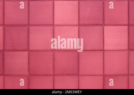 Color of year 2023 Viva Magenta. Image with aged square tiles are toned in pantone color of viva magenta. New Fashion colour. Clay Tile Flooring textu Stock Photo
