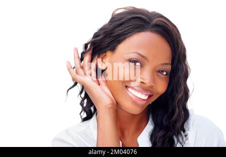 Im listening...Cropped view of a pretty african american woman smiling and listening. Stock Photo