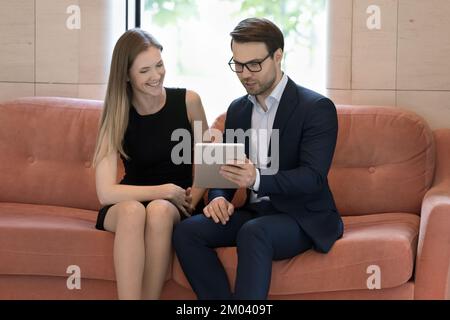 Business partners using digital tablet working meet in workspace Stock Photo