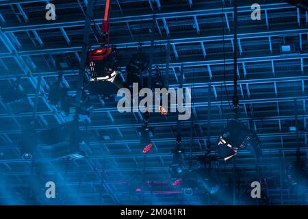 Video reflectors mounted on roof racks in a television studio. Lights hanging from a ceiling which are used for a tv programme. Stock Photo