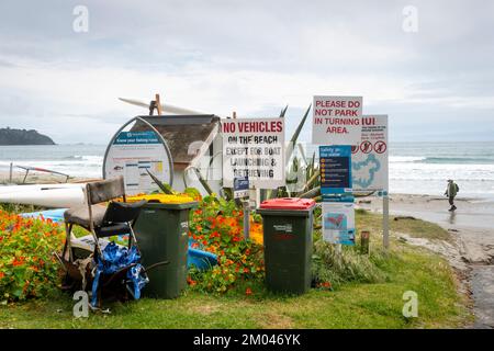 Signs and wheelie bins, Waiheke Island, Auckland, North Island, New Zealand Stock Photo