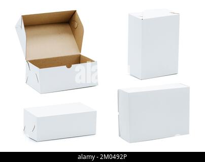 Plain white boxes shot from different angles in composition. One is open. Over white background. Stock Photo