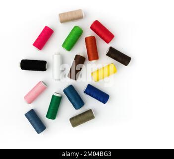set of sewing thread coils, colored spools isolated on white background, sewing theme Stock Photo