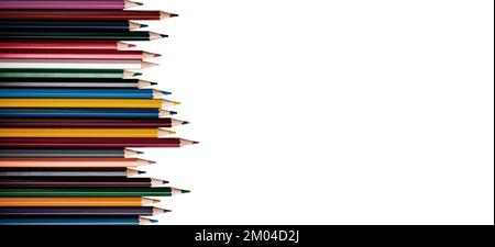Coloured pencils of different color. Drawing supplies on left isolated on white background, banner. High quality photo Stock Photo
