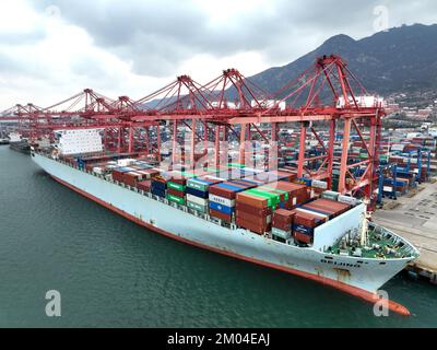 LIANYUNGANG, CHINA - DECEMBER 7, 2022 - Cargo ships dock at their ...