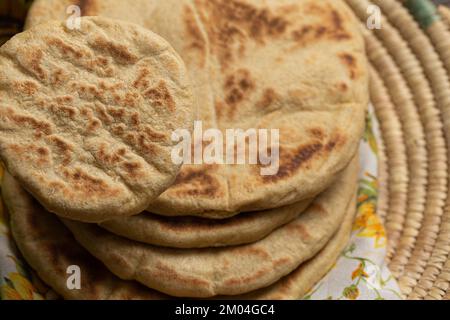 selective focus of arabic flat bread, Moroccan Pita Bread Stock Photo