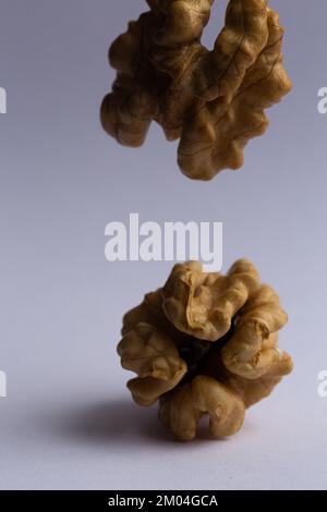 dry peeled walnut on white background Stock Photo