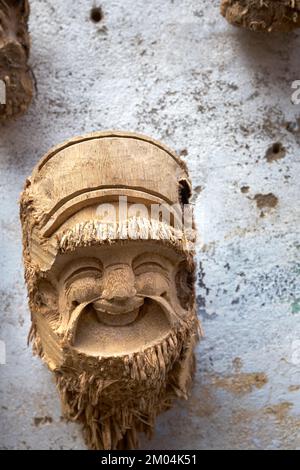 Carved Wood Character Head in a Souvenir Shop in Hoi An Vietnam Stock Photo