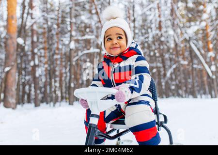 Outdoor summer portrait of adorable 5 year old little girl wearing