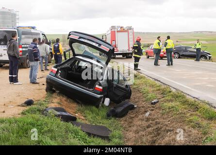 Car from a traffic accident with police, firefighters and people around. Stock Photo