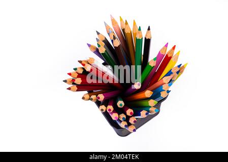 multi-colored felt-tip pens in a glass on a white background, close-up, copy space, contemporary art. Modern design isolated Stock Photo