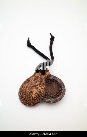 Percussive instrument castanets on the white background Stock Photo - Alamy