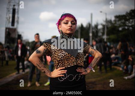 Bogota, Colombia. 03rd Dec, 2022. Concertgoers pose for a portrait during the third day of the comeback of 'Rock al Parque' music festival, the biggest rock festival in latin america and the third biggest rock festival in the world, in Bogota, Colombia, November 27, 2022. Credit: Long Visual Press/Alamy Live News Stock Photo