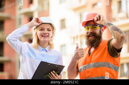 Foreman established supply of building materials. Expert and builder communicate about supply building materials. Purchase of building materials Stock Photo