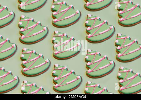 christmas tree pattern. shaped green gingerbread cookies. Traditional food. New Year holiday concept Stock Photo