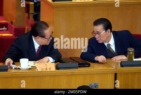 President Jiang Zemin (left) of the People's Republic of China speaking with Li Peng, Chairman of the National People's Congress (NPC) during the opening of the NPC.  ***NOT FOR ADVERTISING USE*** Stock Photo