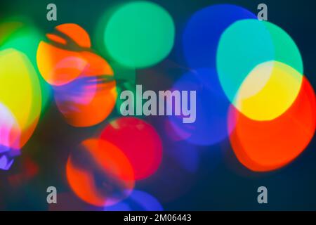 Bokeh background of multicolored christmas and new year lights. Soft focus Stock Photo