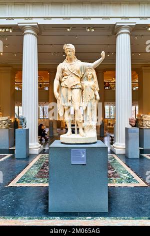 New York. Manhattan. United States. The Metropolitan Museum of Art. Marble statue of Dionysus leaning on an archaistic figure. Greek and Roman Gallery Stock Photo