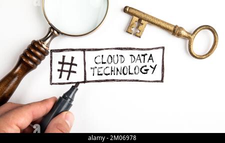 Cloud Data Technology. Golden key and magnifying glass on white background. Stock Photo