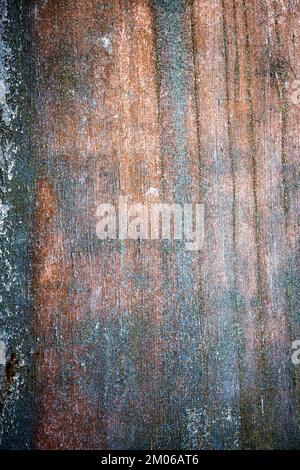 Red and blue stains on concrete wall makes good texture or background Stock Photo