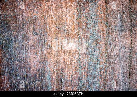 Red and blue stains on concrete wall makes good texture or background Stock Photo