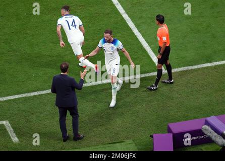 England's Jordan Henderson with manager manager Gareth Southgate after being substituted during the FIFA World Cup Round of Sixteen match at the Al-Bayt Stadium in Al Khor, Qatar. Picture date: Sunday December 4, 2022. Stock Photo