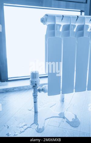 water leak through the heating radiator Stock Photo - Alamy