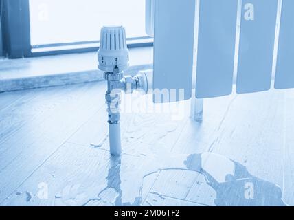water leak through the heating radiator Stock Photo - Alamy