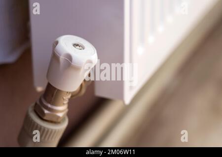 Simple thermostat for regulating the radiator heating temperature Stock Photo