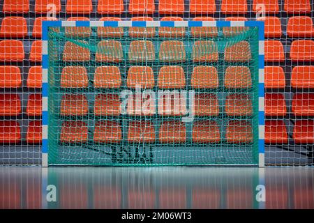 Gate for futsal or handball in gym. Detail of gate frame and net. Outdoor football or handball playground. Horizontal sport poster, greeting cards, he Stock Photo