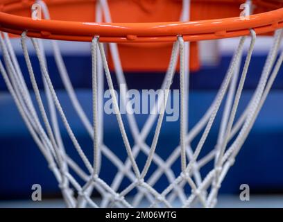 Basketball hoop net isolated on blue background. Professional sport concept. Horizontal sport poster, greeting cards, headers, website Stock Photo
