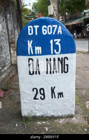 Road side distance marker Hoi An Vietnam Stock Photo