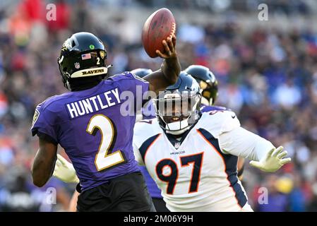 Denver Broncos defensive tackle D.J. Jones (97) speaks with Denver Broncos  defensive tackle Mike Purcell (98) during a practice session in Harrow,  England, Thursday, Oct. 27, 2022. The Denver Broncos will play