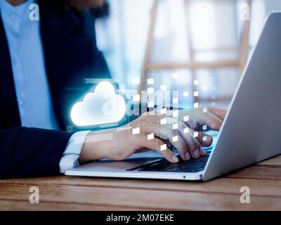 Cloud storage technology concept. Glow cloud tech icon and transfer management digital files and folders on a virtual laptop computer screen. Online D Stock Photo