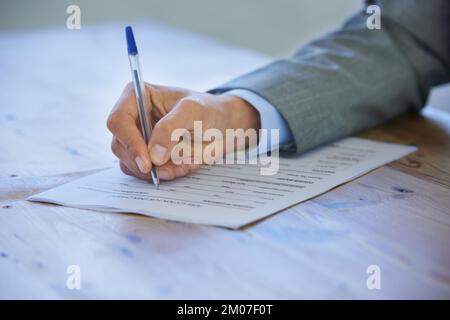 Looking for a new job. Cropped closeup of a young man applying for a job. Stock Photo