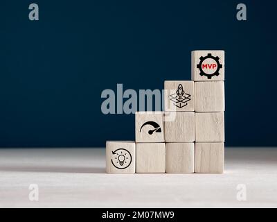 Product development, launching, analysis and market validation. MVP, minimum viable product concept for lean startup. Wooden cubes with new product la Stock Photo