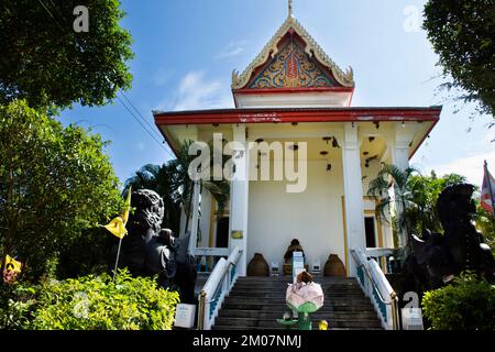 Ancient building church or antique ubosot of Wat Nong Mi temple for thai people travel visit and respect praying blessing mystical holy buddha at Suan Stock Photo