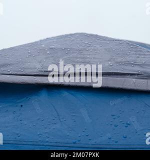 Vorokhta, Ukraine June 12, 2022: raindrops on a tent from Coleman, a double-layer waterproof tent. Stock Photo