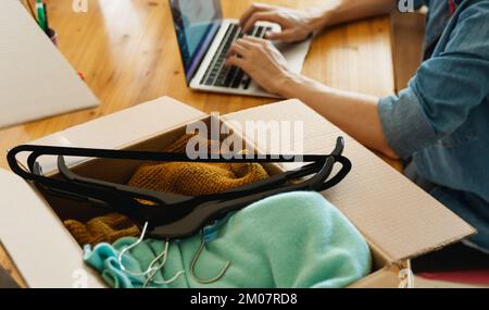 Pre owned clothes resale or donation. Stock Photo