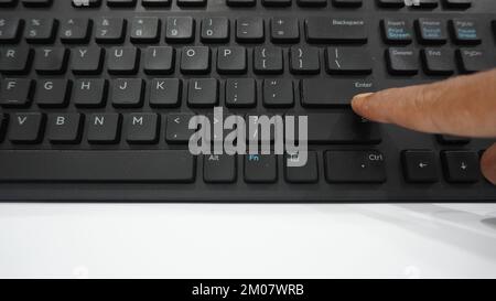 Close up computer keyboard with signature sign marker in office or workspace.  a working tool equipment Stock Photo
