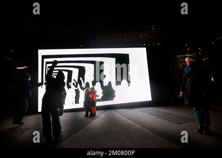 Nobel Week Lights in central Stockholm, Sweden, December 3, 2022. This image: Alas, Alas, the Mirror's Retrospection by Eva Beierheimer at Sergels tor Stock Photo