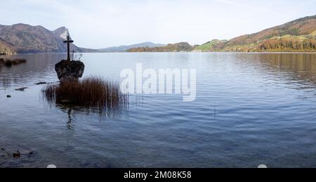 Cross stone, cross on a rock, behind the Drachenwand, Mondsee, Salzkammergut, Upper Austria, Austria, Europe Stock Photo