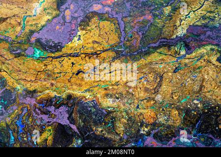 Backgrounds and textures: surface of beautiful decorative stone, abstract multicolored pattern of cracks, spots and stains, natural background Stock Photo